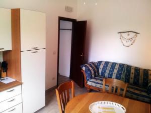 Appartementen in Le Marche, woonkeuken met bank
